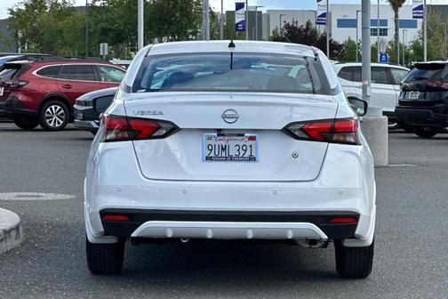 Cloud White 2025 Nissan Versa S
