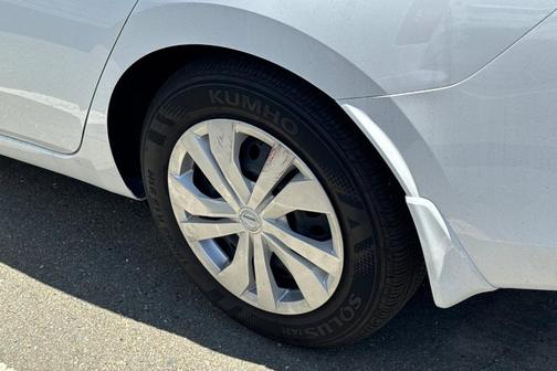 Cloud White 2025 Nissan Versa S