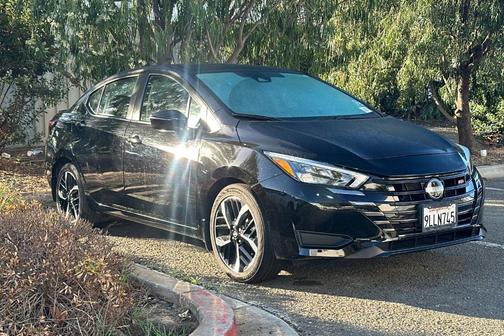 Black 2024 Nissan Versa 1.6 SR