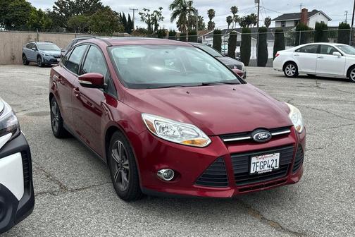 Red 2014 Ford Focus SE