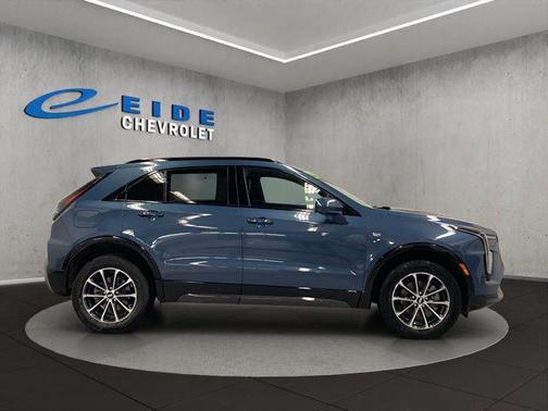 Blue 2025 Cadillac XT4 Sport