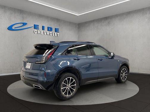 Blue 2025 Cadillac XT4 Sport