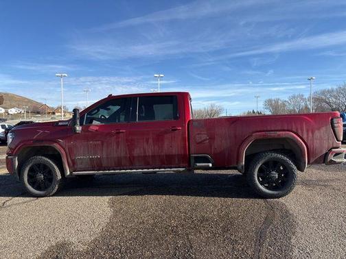 Volcanic Red Tintcoat 2024 GMC Sierra 3500 AT4