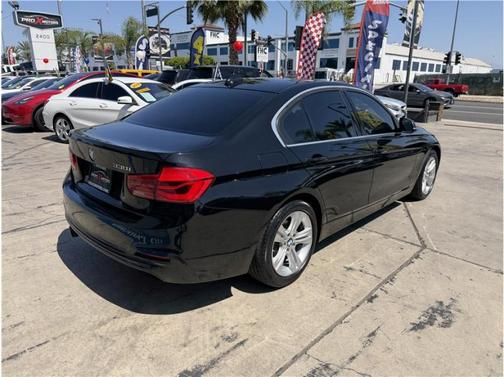 Black 2017 BMW 330 330i Sedan 4D