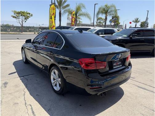 Black 2017 BMW 330 330i Sedan 4D