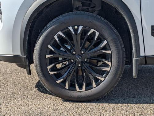 Everest White P 2026 Nissan Rogue Dark Armor