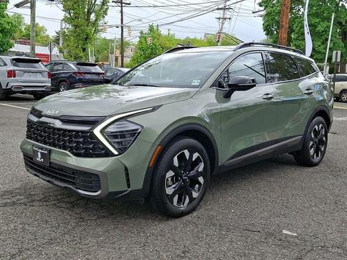 Green 2024 Kia Sportage X-Line