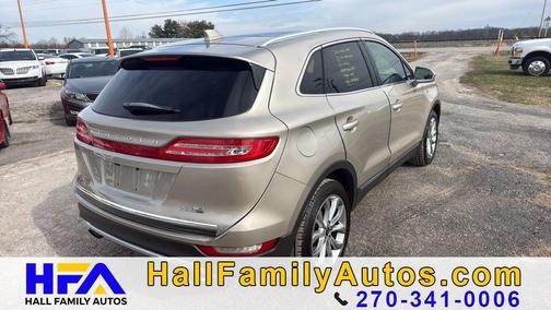 Tan 2015 Lincoln MKC Base