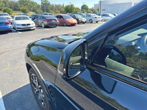 Black Sapphire Metallic 2024 BMW X4 xDrive30i