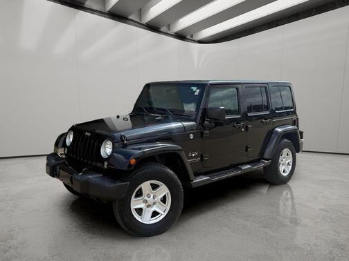 Black 2016 Jeep Wrangler Unlimited Sahara