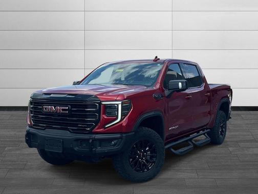 Volcanic Red Tintcoat 2023 GMC Sierra 1500 AT4X