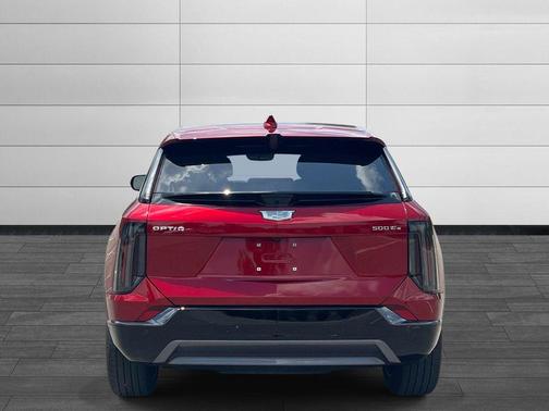 Radiant Red 2025 Cadillac OPTIQ Sport 2 AWD