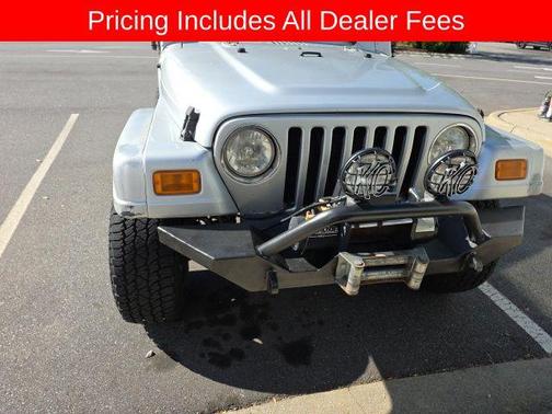 Bright Silver Metallic Clearcoat/Med Gray Soft Top 2005 Jeep Wrangler X