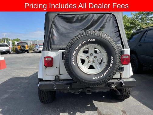 Bright Silver Metallic Clearcoat/Med Gray Soft Top 2005 Jeep Wrangler X