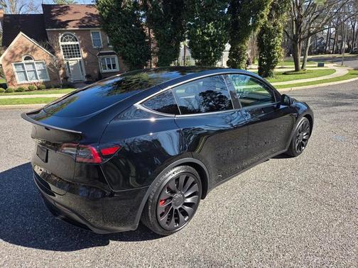 Solid Black 2023 Tesla Model Y Performance Dual Motor All-Wheel Drive