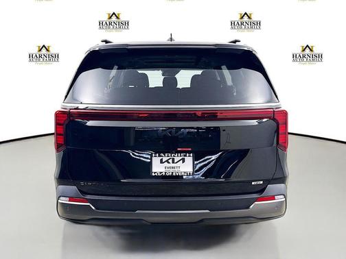 Aurora Black Pearl 2026 Kia Carnival Hybrid SX