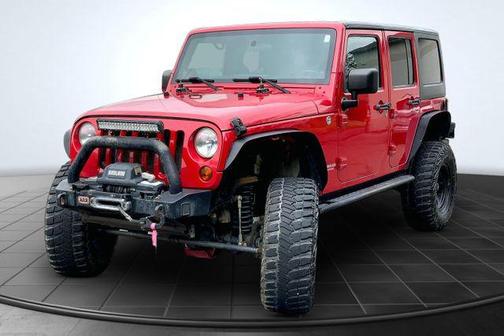 Red 2012 Jeep Wrangler Unlimited Rubicon