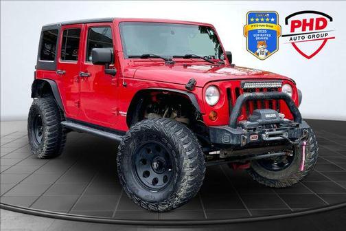 Red 2012 Jeep Wrangler Unlimited Rubicon