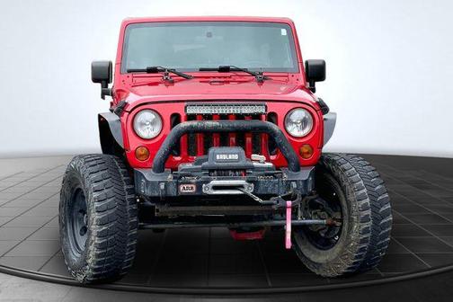 Red 2012 Jeep Wrangler Unlimited Rubicon