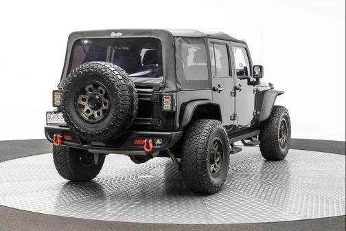 Black 2012 Jeep Wrangler Unlimited Rubicon