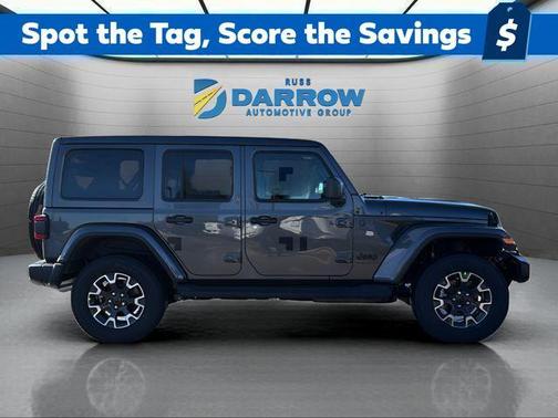 Gray 2026 Jeep Wrangler 4-Door Sahara 4x4