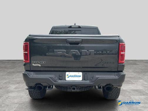 Diamond Black Crystal Pearlcoat 2025 RAM 1500 RHO Crew Cab 4x4 5'7' Box