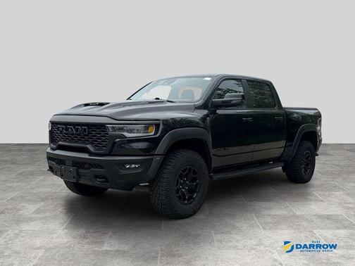 Diamond Black Crystal Pearlcoat 2025 RAM 1500 RHO Crew Cab 4x4 5'7' Box
