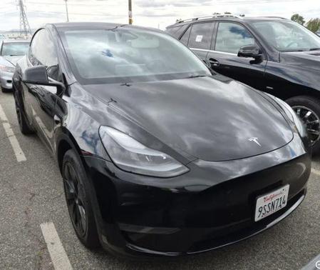 Solid Black 2025 Tesla Model Y Long Range Dual Motor Rear-Wheel Drive