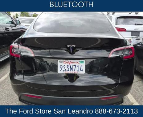 Solid Black 2025 Tesla Model Y Long Range Dual Motor Rear-Wheel Drive