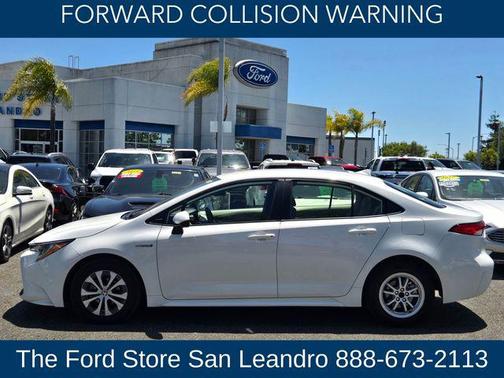 Super White 2021 Toyota Corolla Hybrid LE
