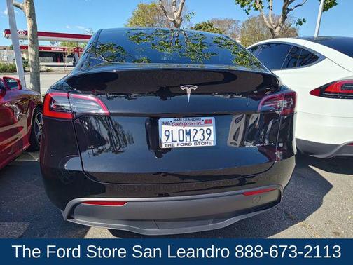 Solid Black 2024 Tesla Model Y Long Range Dual Motor All-Wheel Drive