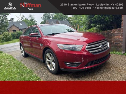 Red 2014 Ford Taurus SEL
