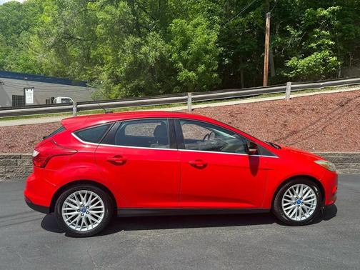 Red 2012 Ford Focus SEL