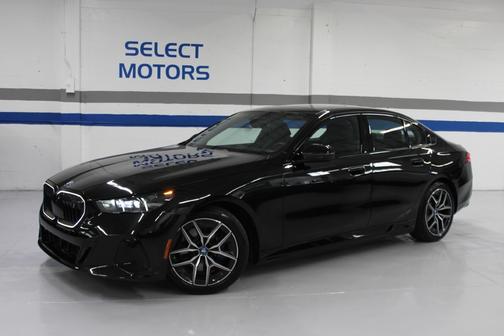 BLACK 2024 BMW i5 eDrive40