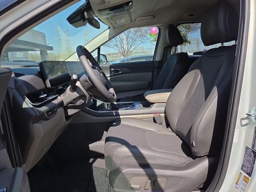 Ivory Silver 2026 Kia Carnival EX
