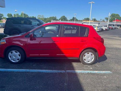 Red Alert Metallic 2009 Nissan Versa 1.8 S