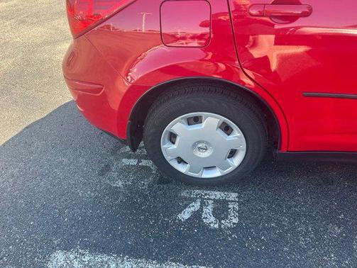 Red Alert Metallic 2009 Nissan Versa 1.8 S