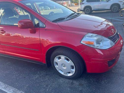 Red Alert Metallic 2009 Nissan Versa 1.8 S