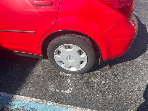 Red Alert Metallic 2009 Nissan Versa 1.8 S
