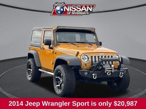 Amp'd 2014 Jeep Wrangler Sport