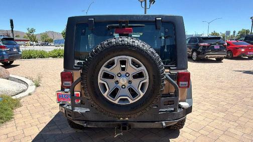 Copper Brown Pearlcoat 2015 Jeep Wrangler Unlimited Sport