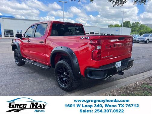 Radiant Red 2026 Chevrolet Silverado 1500 Custom Trail Boss