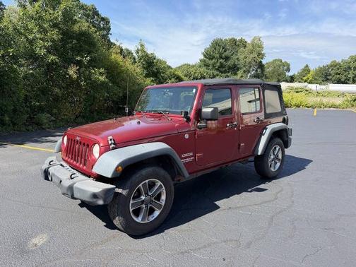 Flame Red 2012 Jeep Wrangler Unlimited 4WD 4dr Sport