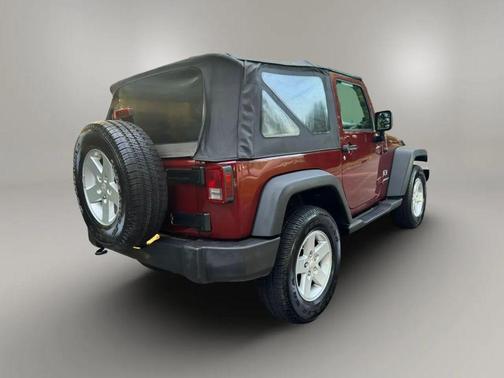 Red 2009 Jeep Wrangler Sport