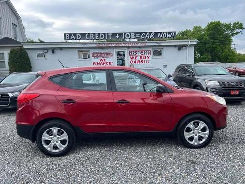 Garnet Red 2010 Hyundai TUCSON GLS