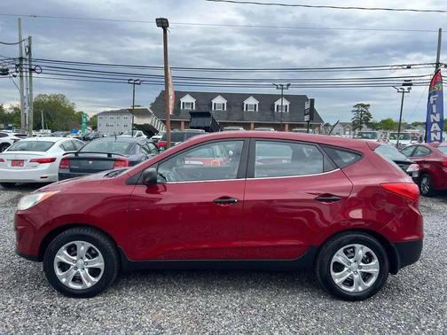 Garnet Red 2010 Hyundai TUCSON GLS