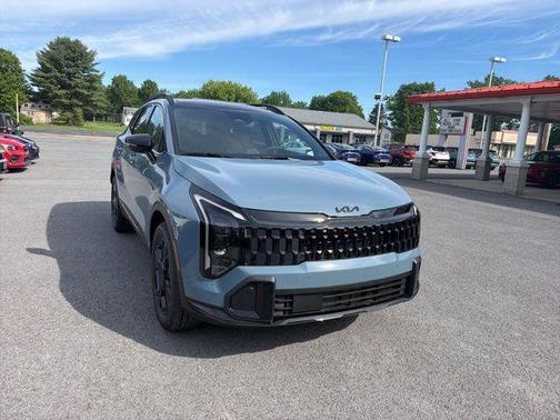 Heritage Blue 2026 Kia Sportage Hybrid X-Line