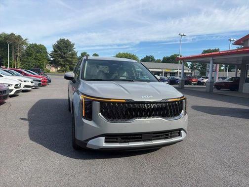 Ceramic Silver 2026 Kia Carnival Hybrid EX