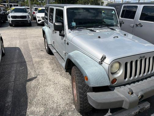 Bright Silver Metallic Clearcoat 2012 Jeep Wrangler Unlimited Sport
