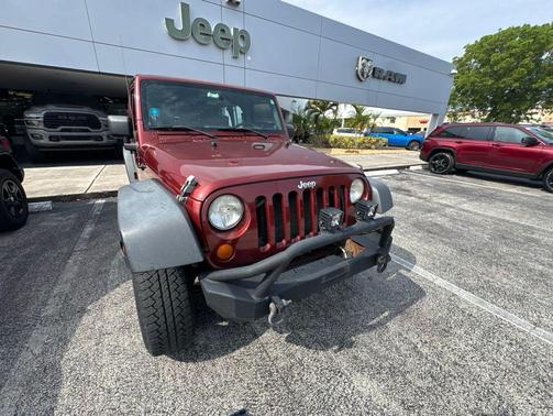 Red Rock Crystal Pearlcoat 2009 Jeep Wrangler Unlimited X